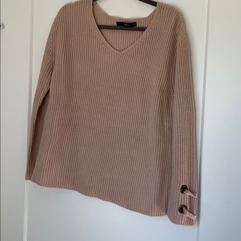 Light pink knitted sweater